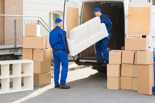 Office relocation planning in St Johns Wood with packed boxes and desks