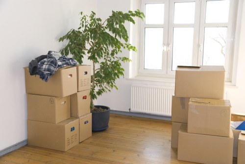 Packed boxes and furniture prepared for a house move in St Johns Wood
