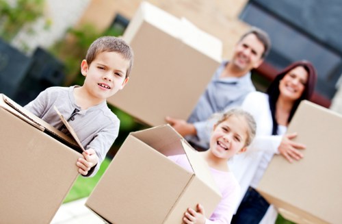 Loading furniture and boxes into a van for a local move in St Johns Wood