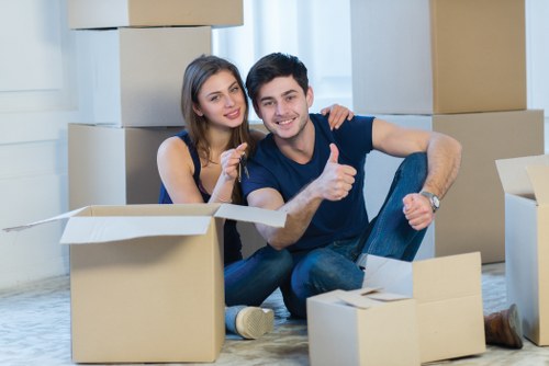 Packed boxes and furniture prepared for a flat move in St Johns Wood