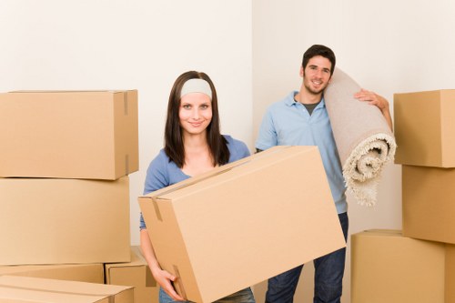Packed moving boxes and furniture ready for removals in St Johns Wood