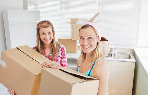 Packed boxes and furniture prepared for a man and van service in St Johns Wood