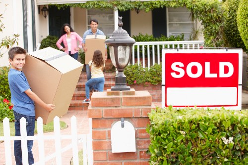 Trained removals staff preparing items with careful handling